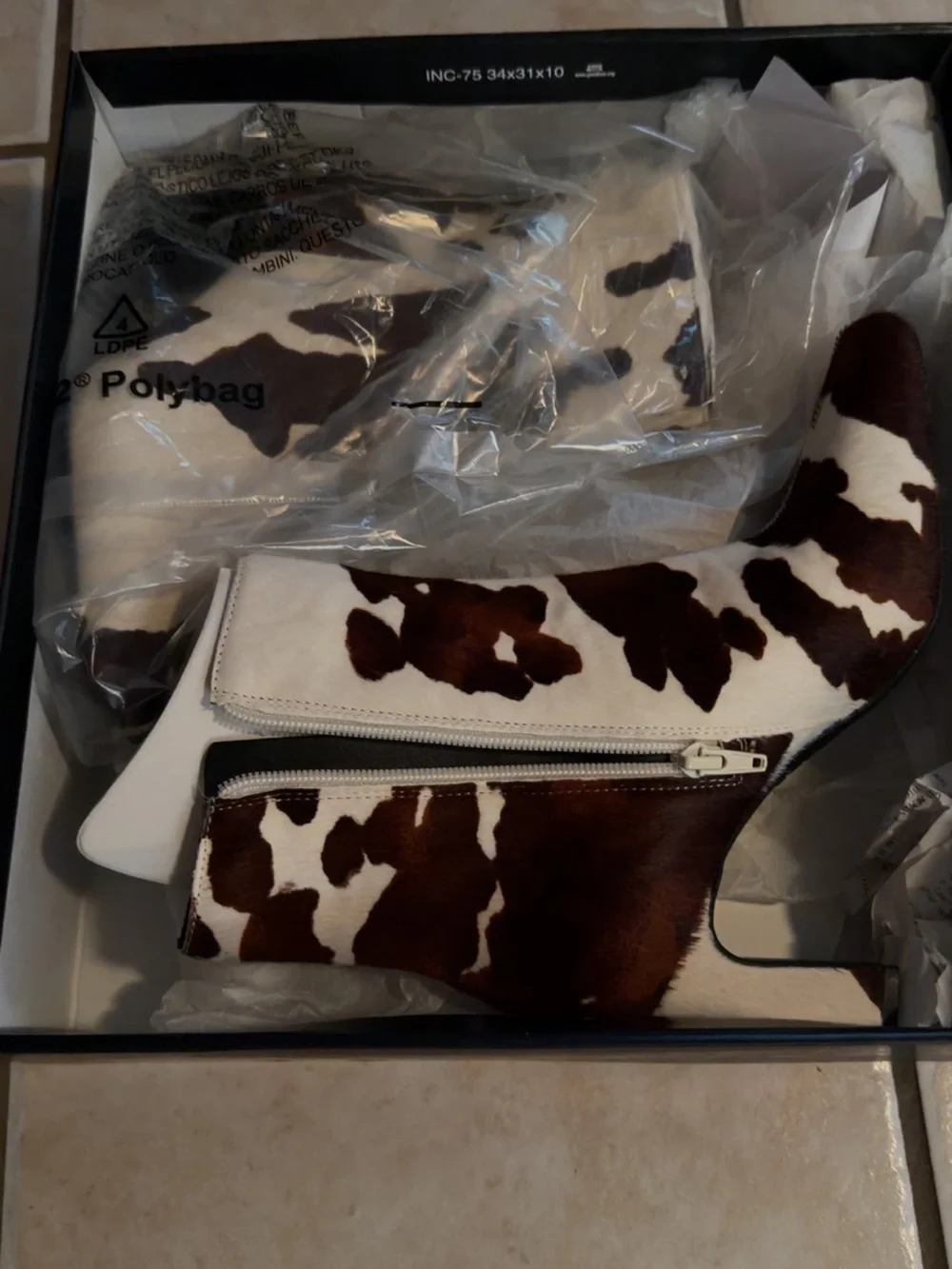 INC International Concepts Cow-Print Ankle Booties in Brown & White